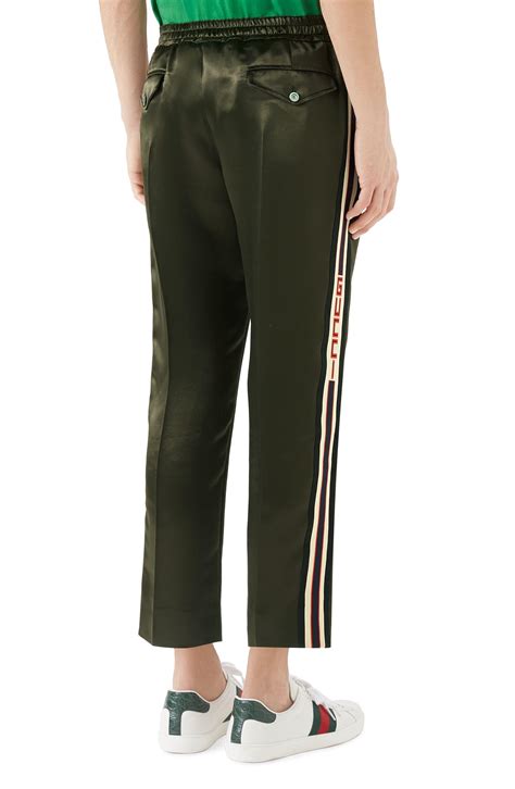 gucci silk pants green|gucci knitted track pants.